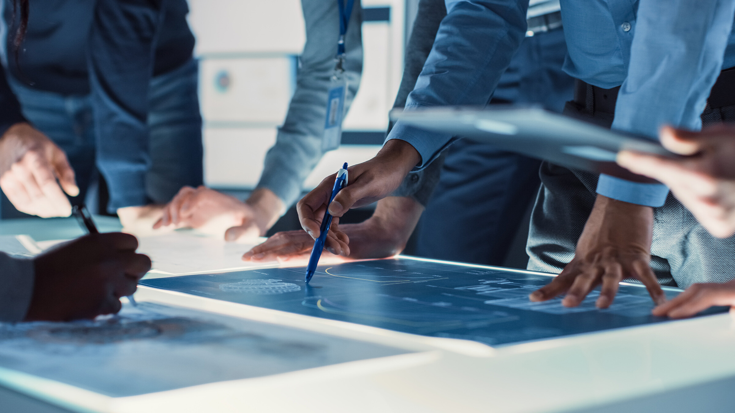 People working together on strategic documents